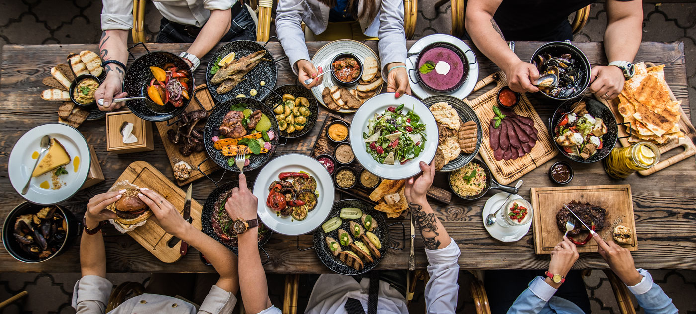 large outdoor meal with friends and family